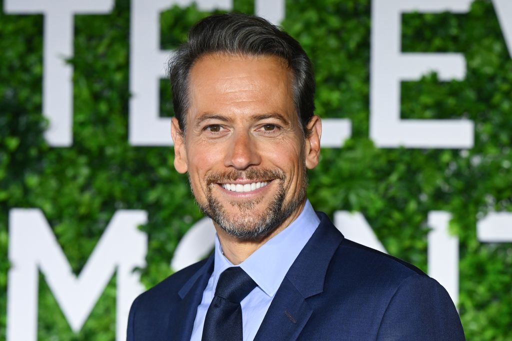 Ioan Gruffudd smiling at a red carpet event