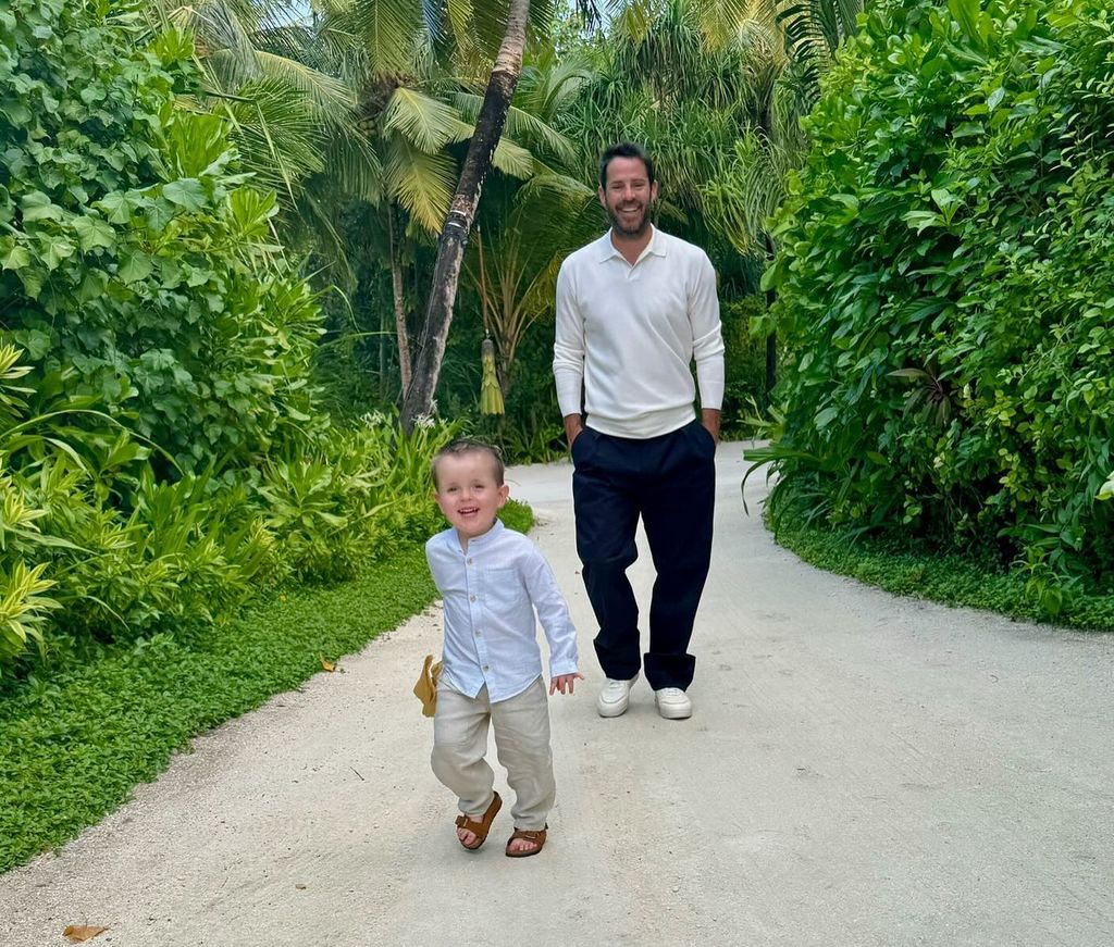 father and son on holiday wearing smart clothes 