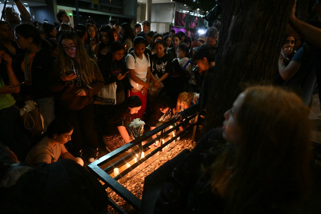 Fans of Liam Payne lit candles next to the hotel where he died in Buenos Aires 