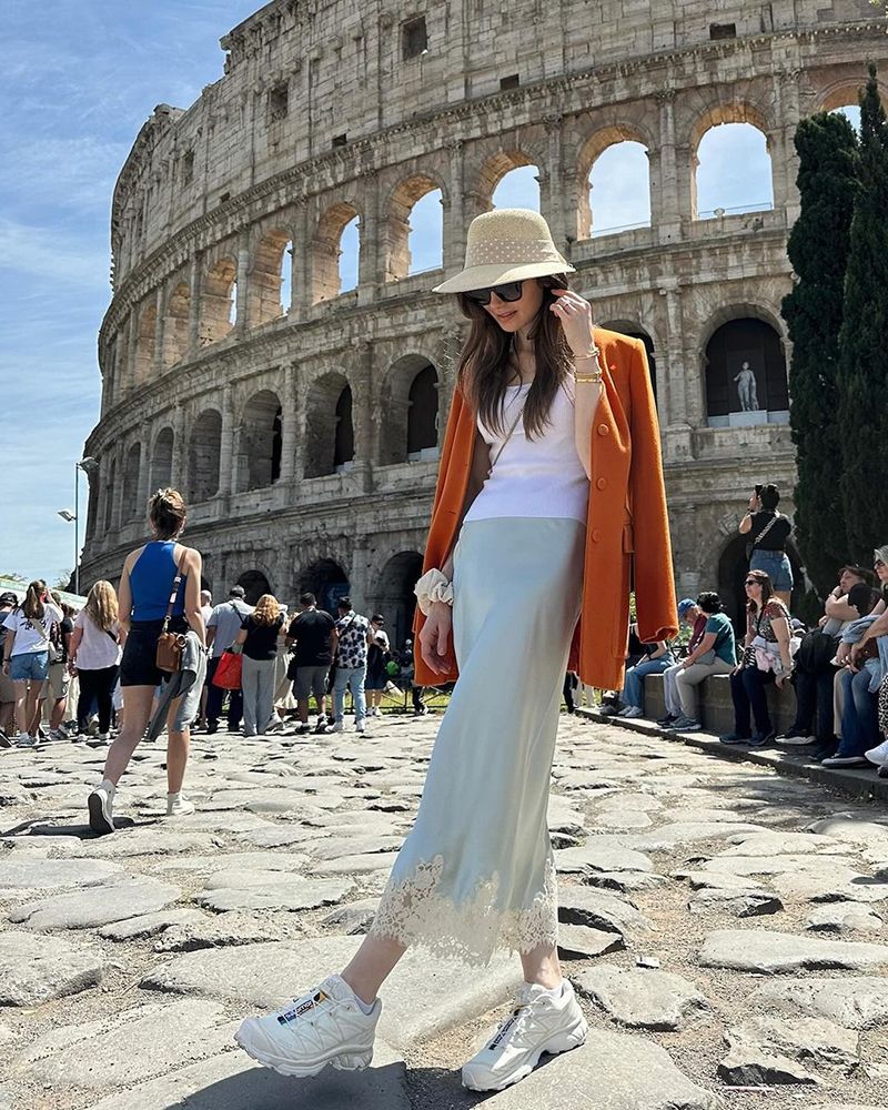 Lily Collins by the Colosseum