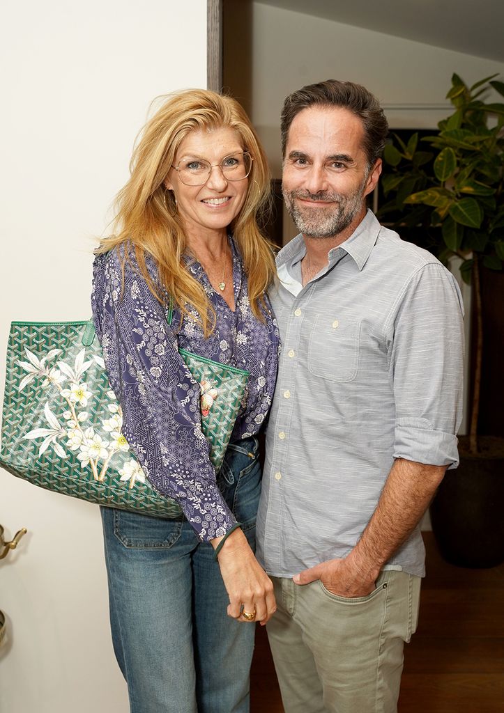 Connie Britton cuddles up to her partner David Windsor at Soho.Home.Studio Melrose in Los Angeles