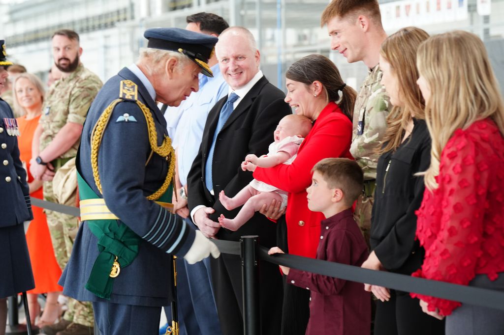King Charles III meets RAF soldiers and their families, during a visit to RAF Lossiemouth 