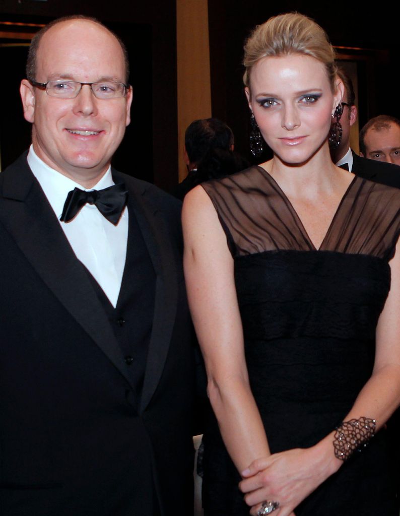 Charlene in black dress with albert in black tie