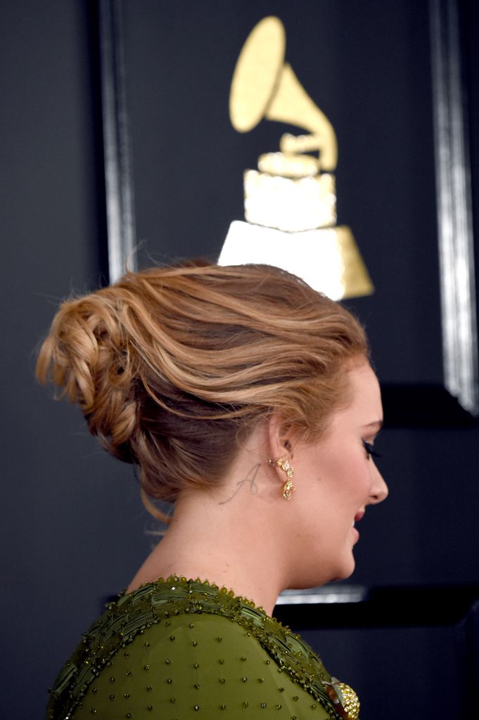  Singer Adele, hair detail, attends The 59th GRAMMY Awards at STAPLES Center on February 12, 2017 