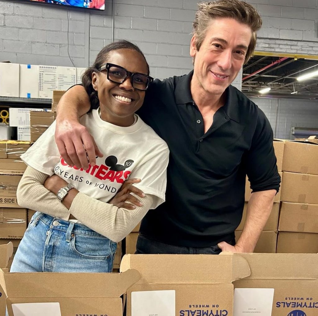 Photo shared by Deborah Roberts on Instagram December 17, 2023, posing with David Muir as they volunteered for City Meals.