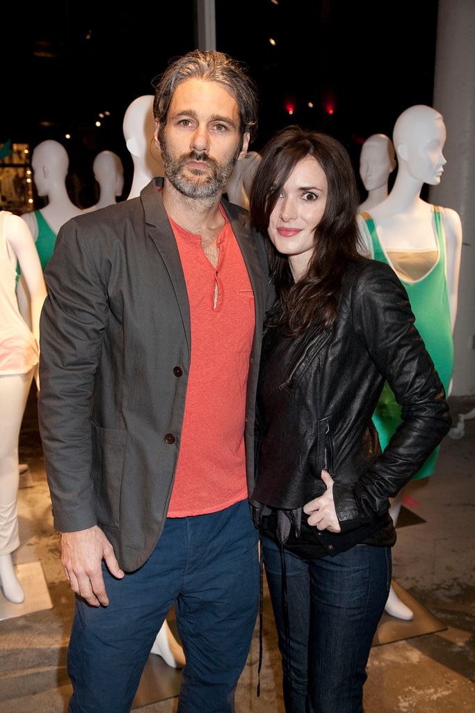 Scott Mackinlay Hahn and Winona Ryder attend Loomstate 321's collection launch party at Treasure & Bond. Ryder wears Loomstate 321 and Rogan.