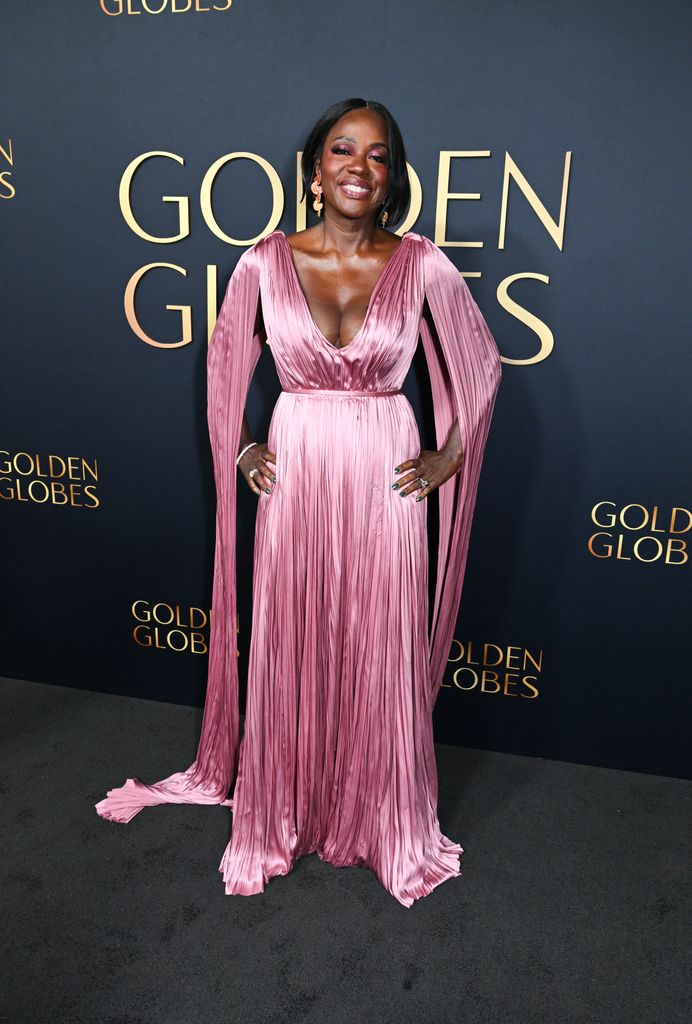 Viola Davis posed in pink satin dress