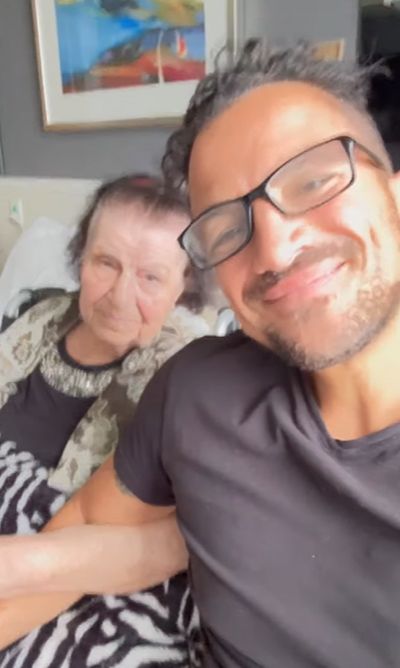 Peter Andre and his mum sitting in a care home