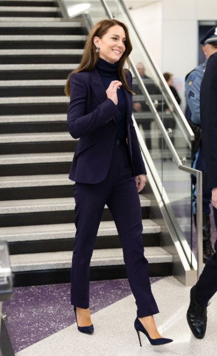 kate middleton wearing purple suit at boston airport