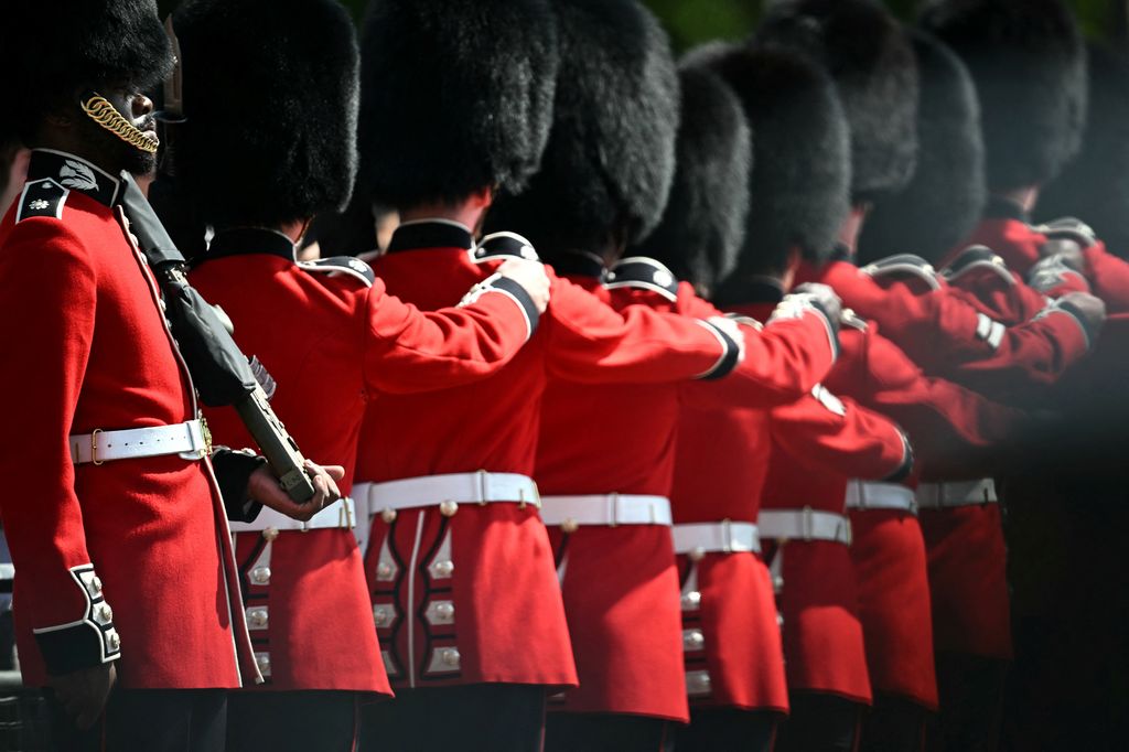 Scots Guards, a regiment of the Household Division Foot Guards, take part in the King's Birthday Parade "Trooping the Colour"