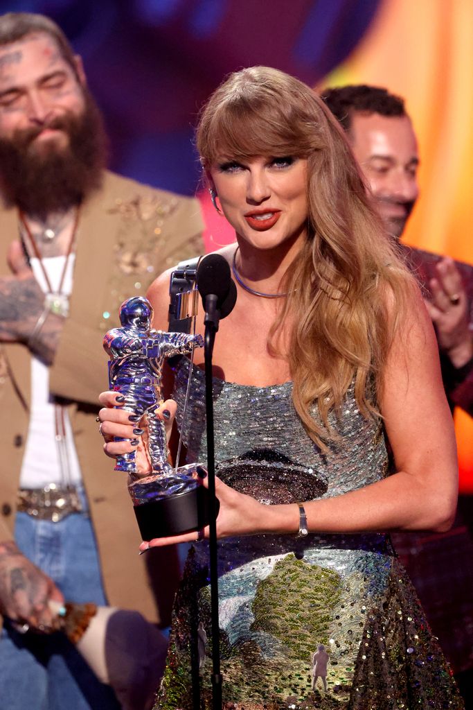 Taylor Swift accepts the the Video of the Year award (Presented by Burger King) for "Fortnight" on stage during the 2024 MTV Video Music Awards