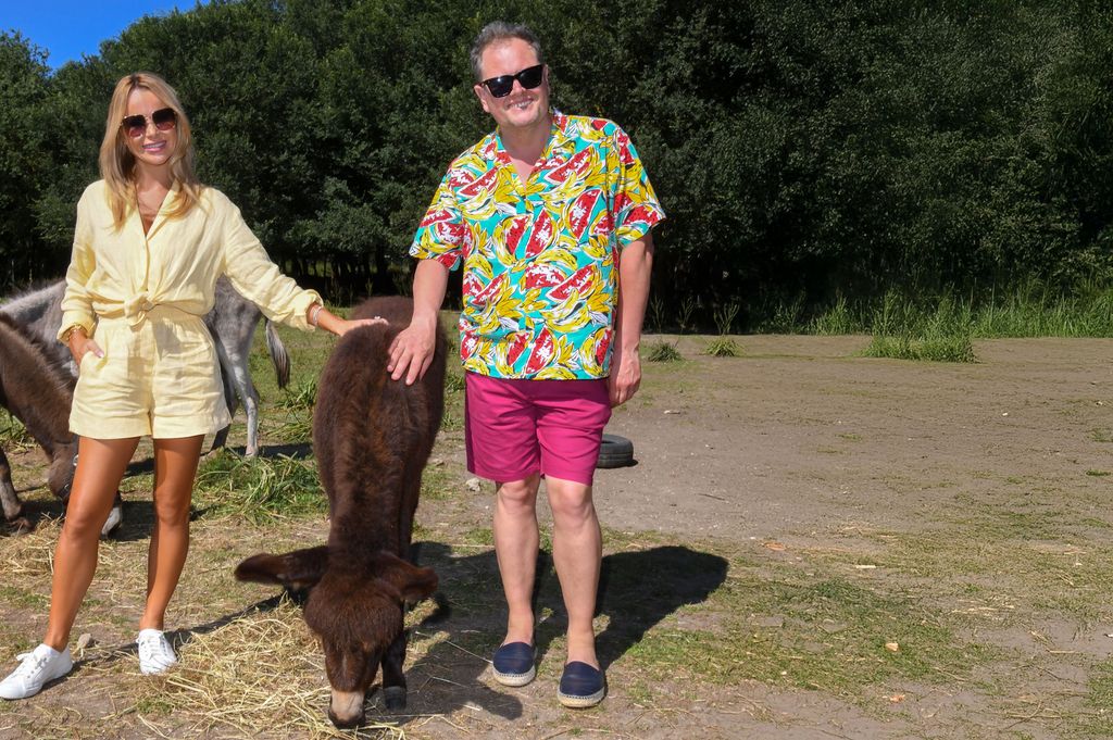 Amanda Holden wearing a yellow shirt with yellow shorts on Amanda & Alan's Greek Job