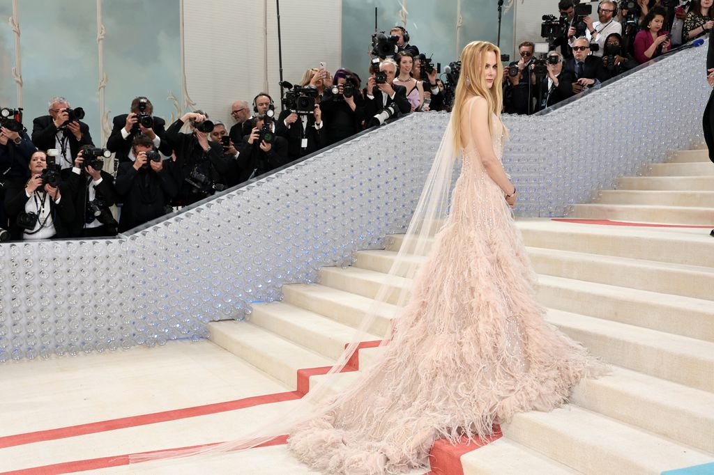 Nicole Kidman stuns in pink silk Chanel dress on the steps of the Met Gala