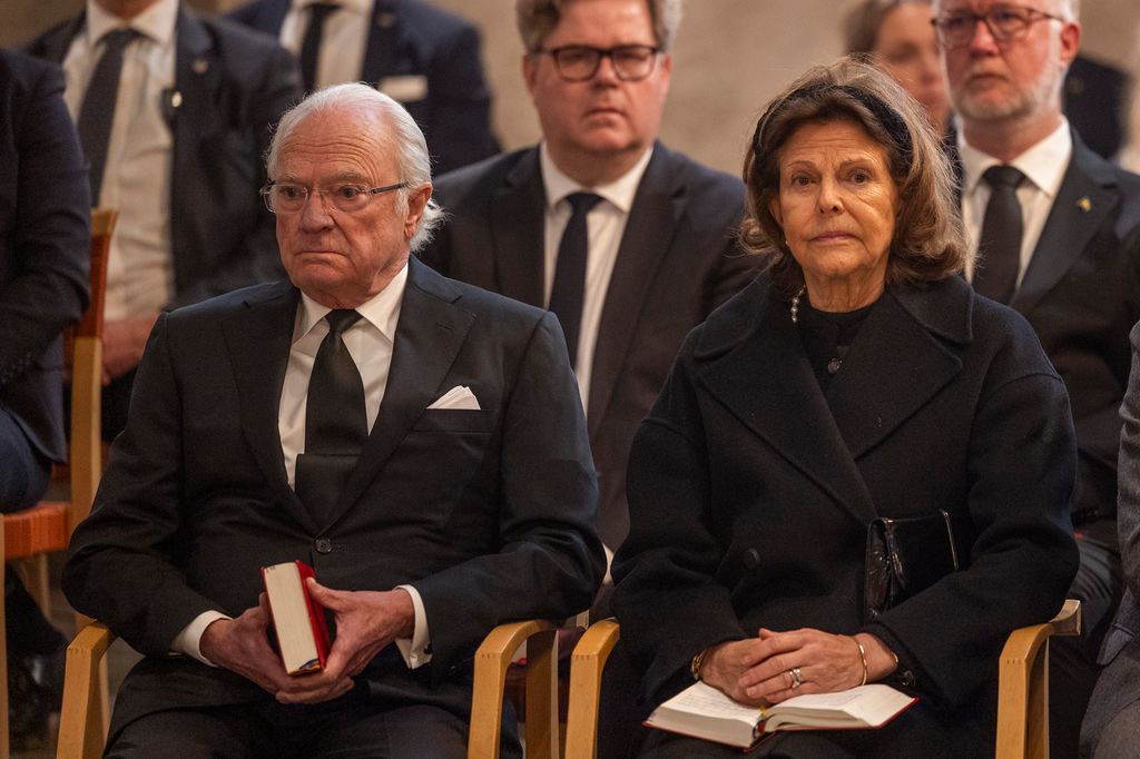 King Carl XVI Gustaf and Queen Silvia attend a ceremony at St. Nicolai Church to honour the victims of the attack on February 5, 2025 in Orebro, Sweden
