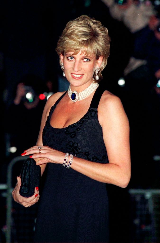 Princess Diana in black dress with red nails