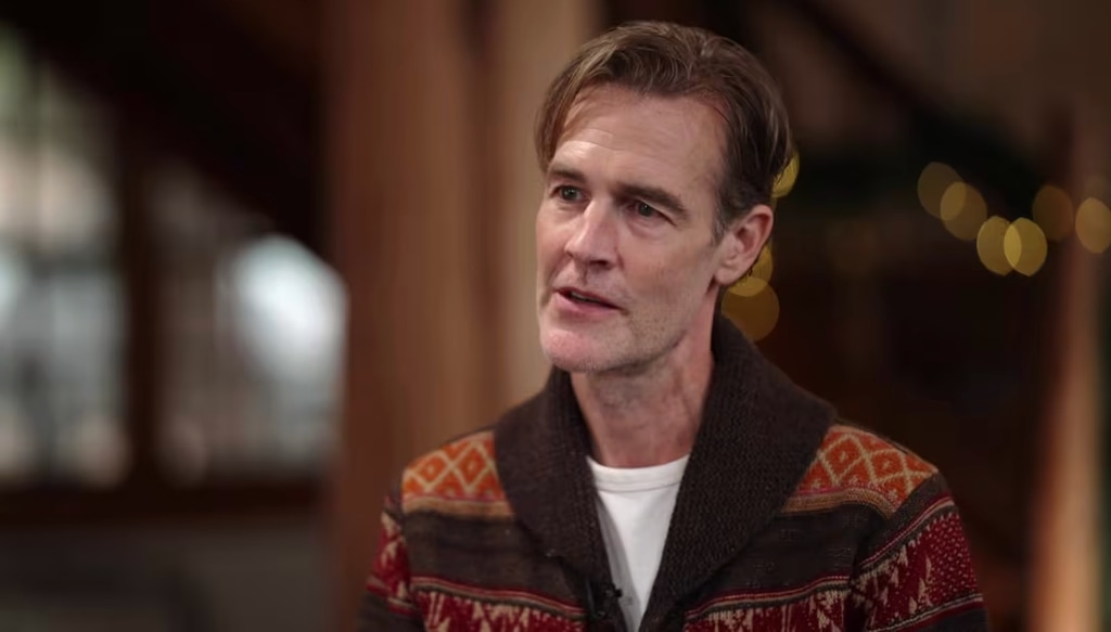 James Van Der Beek in brown and orange sweater