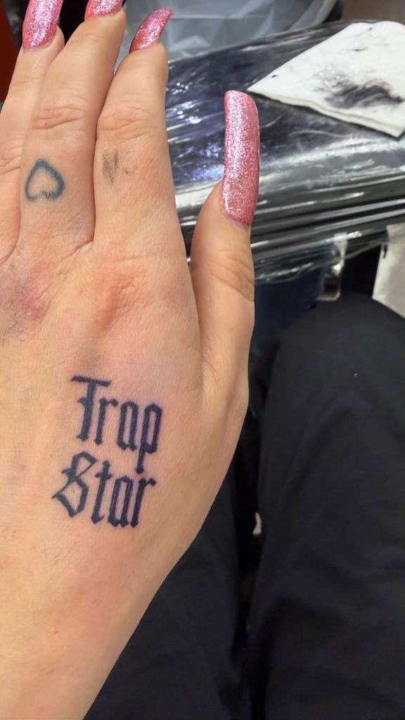 amanda bynes trap star tattoo