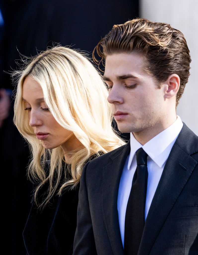 Princess Maria-Olympia and Prince Constantine-Alexios in black outfits at a funeral