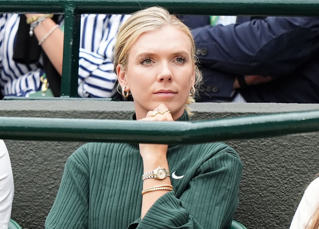 Katie Boulter watches her boyfriend Alex de Minaur 