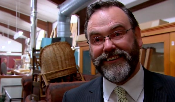 Close-up of man in suit smiling