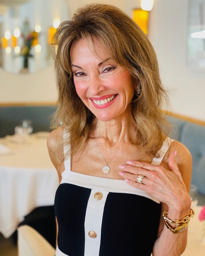 Susan Lucci wearing a black and white dress 