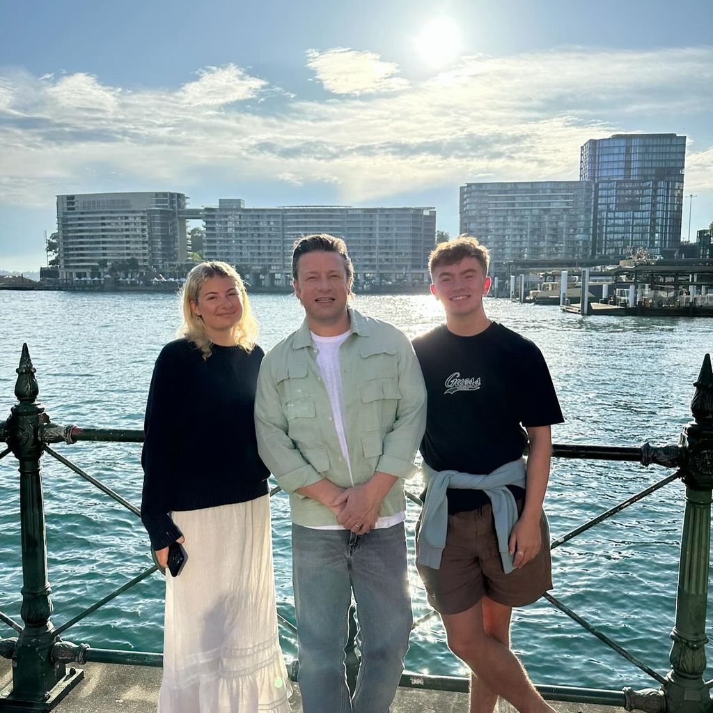 jamie oliver by sea with poppy and her boyfriend