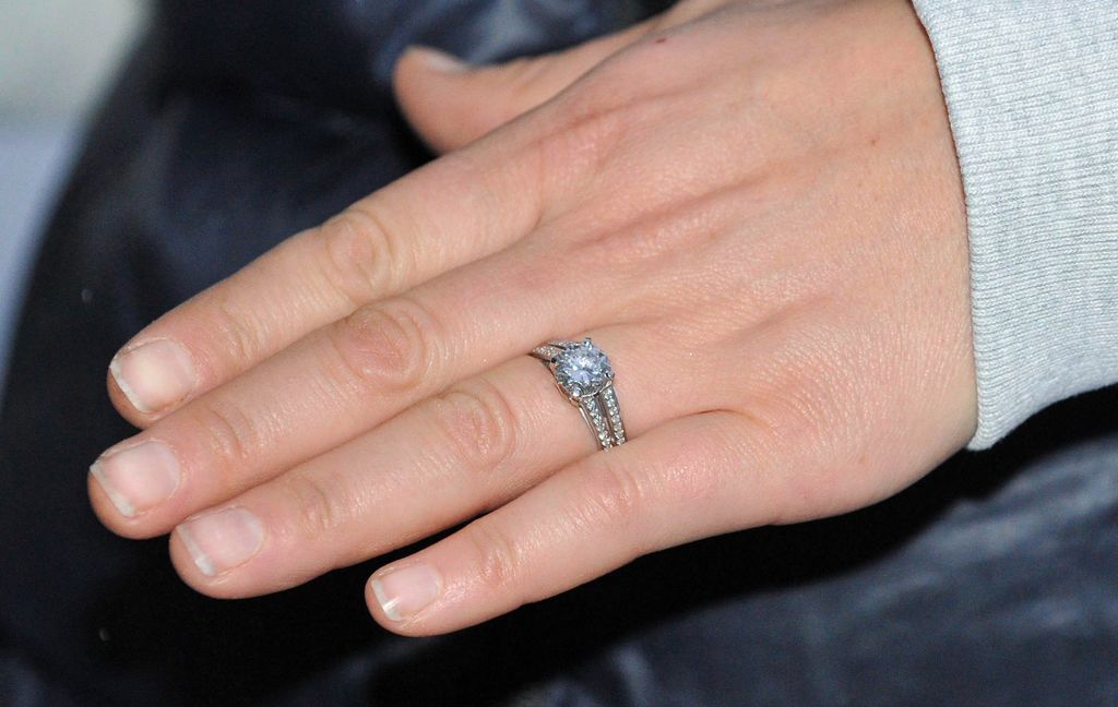 GLOUCESTER, UNITED KINGDOM - DECEMBER 21:  Ring detail as Zara Phillips and her fiance Mike Tindall pose at their Gloucestershire home, after they announced their engagement on December 21, 2010 in Gloucester, United Kingdom. The Queen's granddaughter said she was left "shocked" but "very happy" when her long-term boyfriend and England rugby player proposed. (Photo by Tim Ireland - WPA Pool/Getty Images)