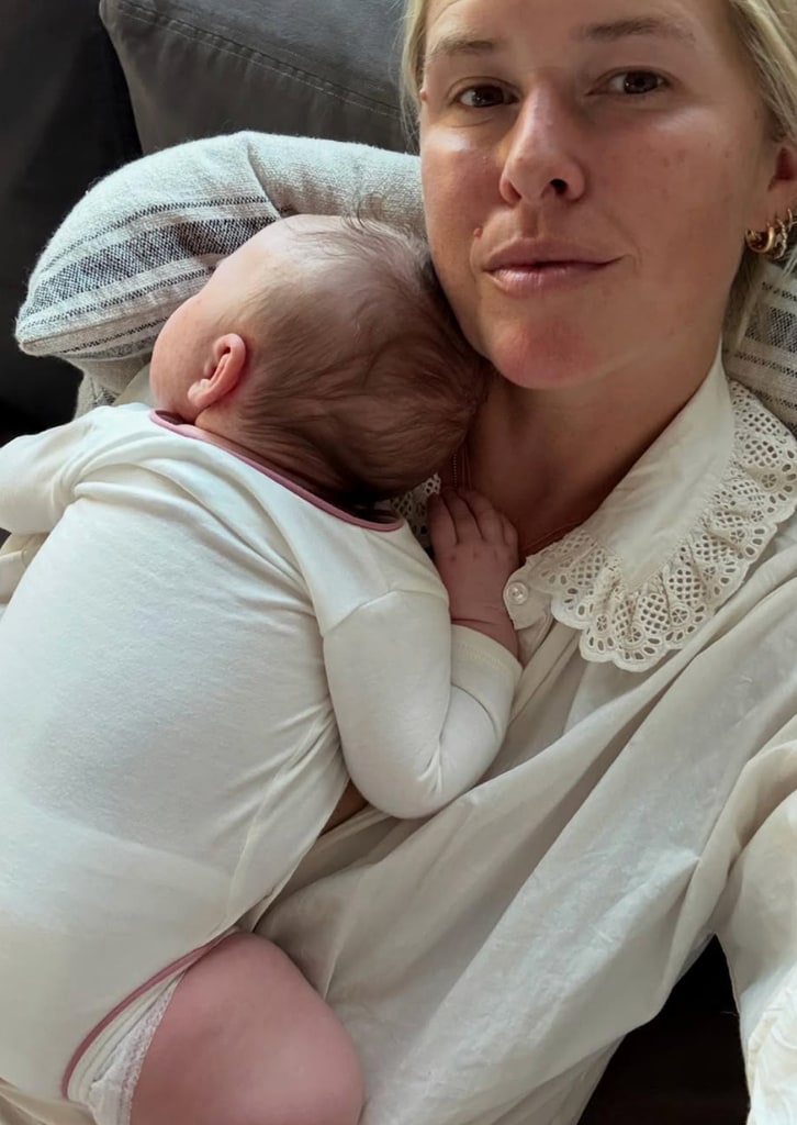 Photo shared by Eric Christian Olsen's wife Sarah Wright of her snuggling with their newborn, their fourth child, daughter Ocean Rain