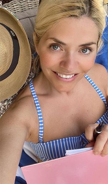 holly willoughby sunbathing blue bikini