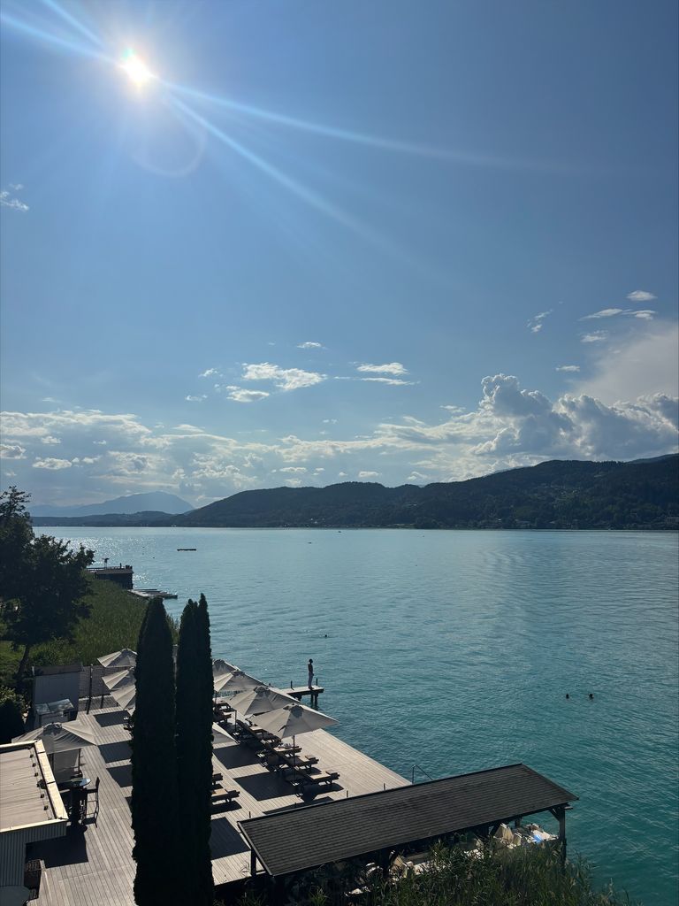 blue lake in austria with blue skies