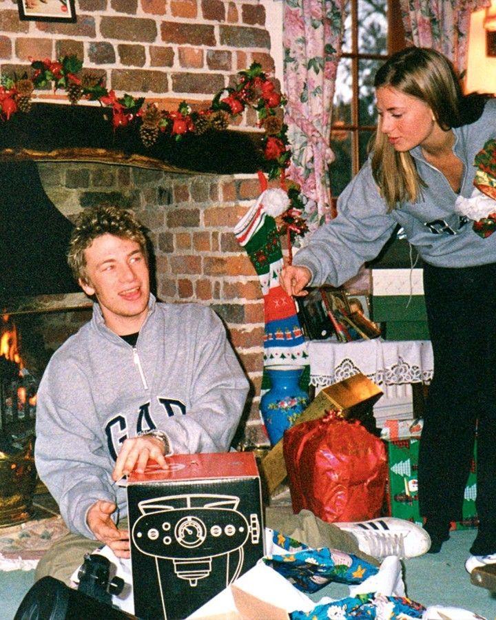 Jamie pictured with his sister Anna in an unearthed family photograph taken at Christmas time