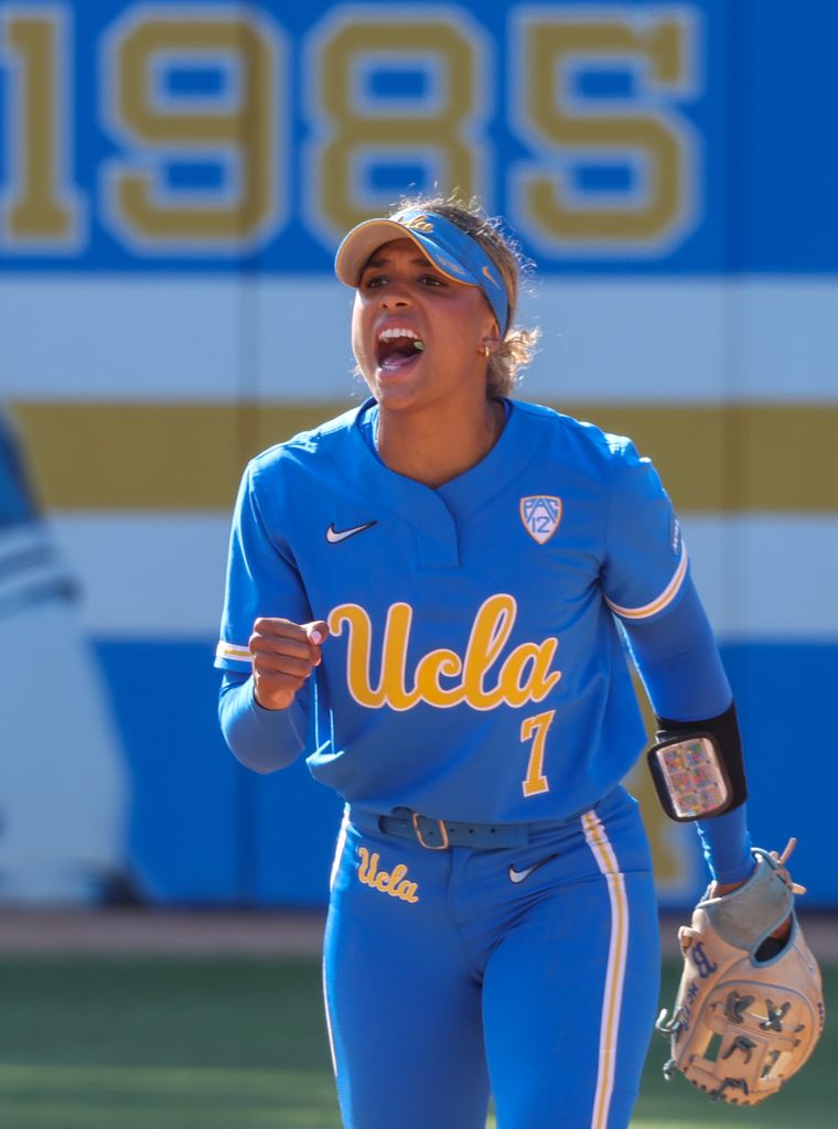 Maya in blue kit during the UCLA Bruins women's softball