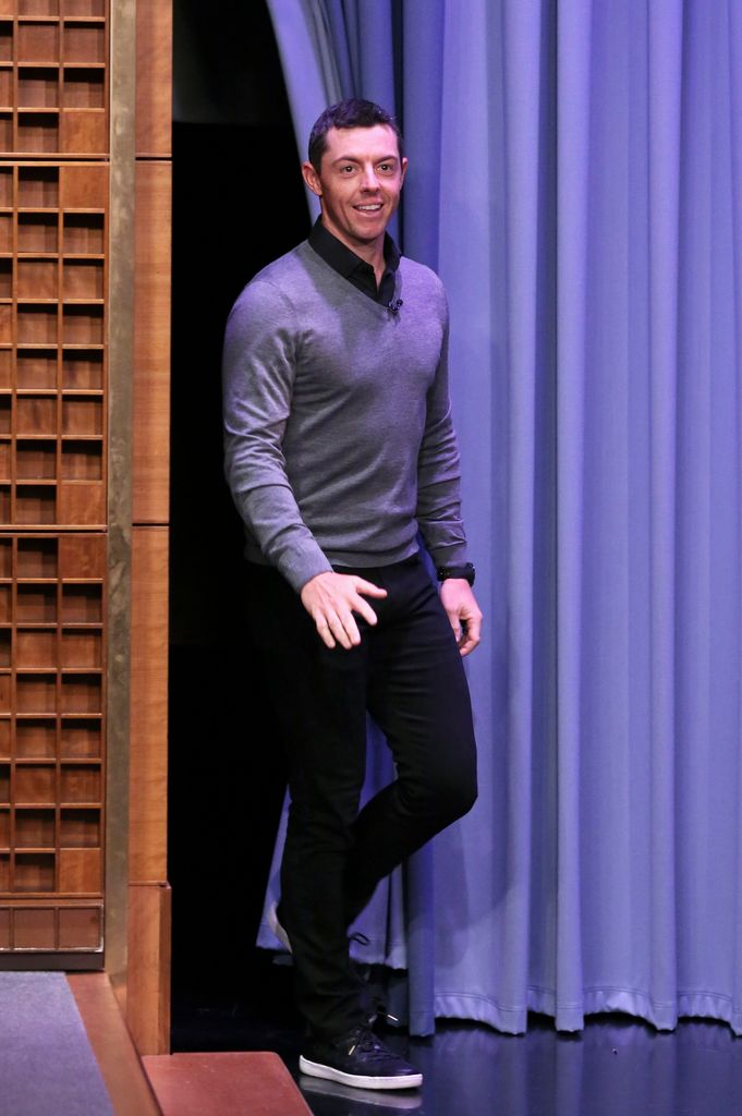 Rory McIlroy in gray jumper and black pants on Jimmy Fallon show