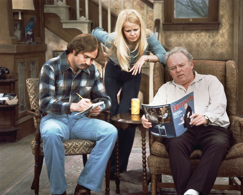 Rob Reiner as Michael Stivic, Sally Struthers as Gloria Bunker-Stivic and Carroll O'Connor as Archie Bunker on "All in the Family". 