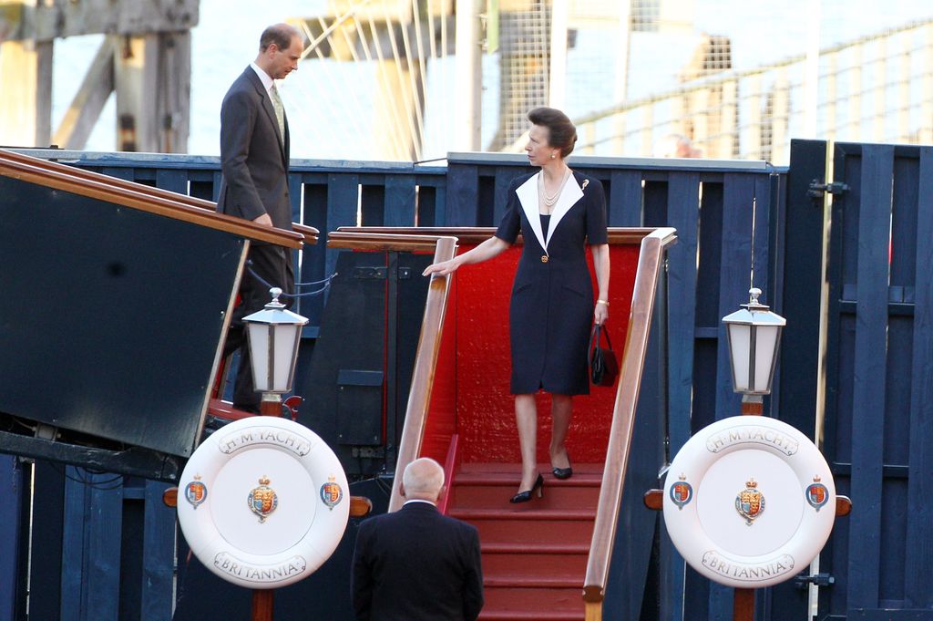 Princess Anne walking down steps of the Royal Yacht Britannia