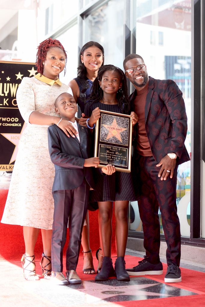 Torrei Hart, Hendrix Hart, Eniko Parrish, Heaven Hart and honoree Kevin Hart pose for a photo as Kevin Hart is honored with a star on the Hollywood Walk of Fame on October 10, 2016 in Hollywood, California