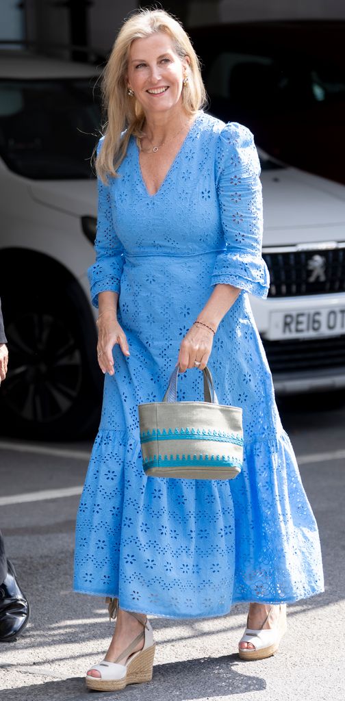 Sophie, Duchess of Edinburgh walking in blue dress and wedges
