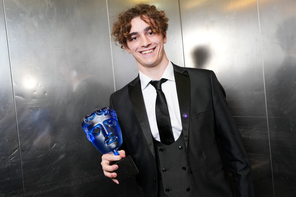 Rhys Connah wins the P&O Cruises Memorable Moment Award for 'Happy Valley' poses backstage during the 2024 BAFTA Television Awards 