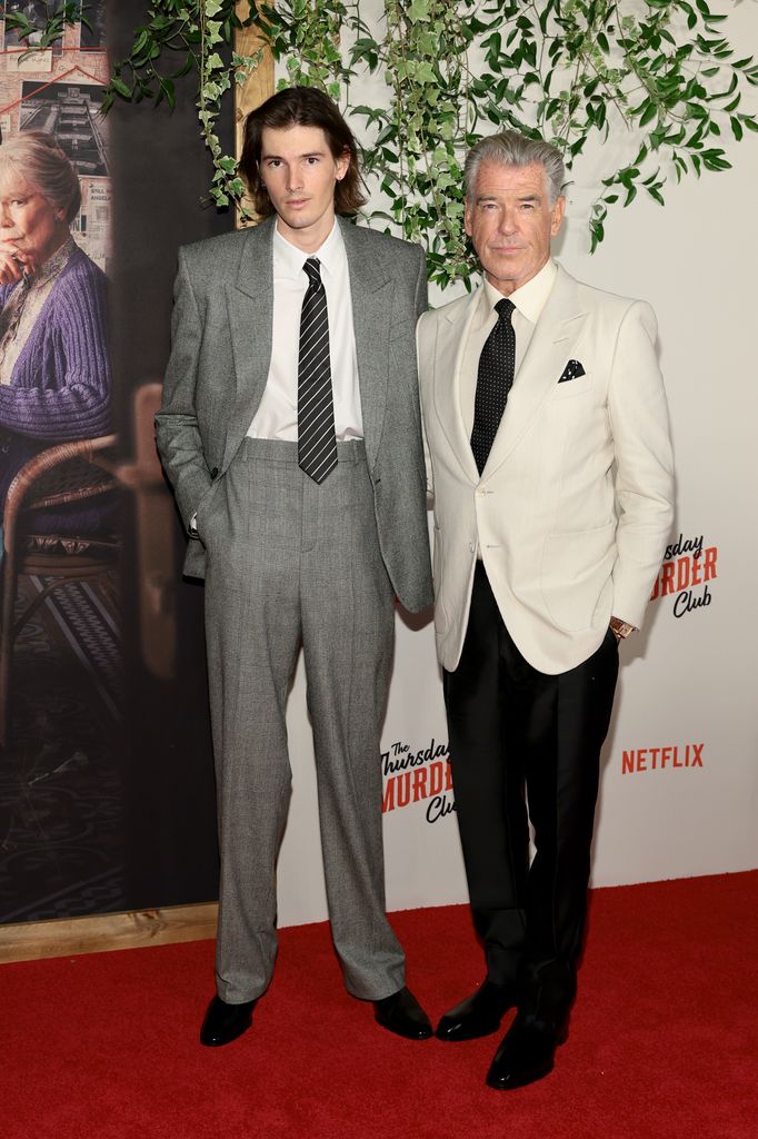 dylan brosnan and pierce brosnan in suits at film screening
