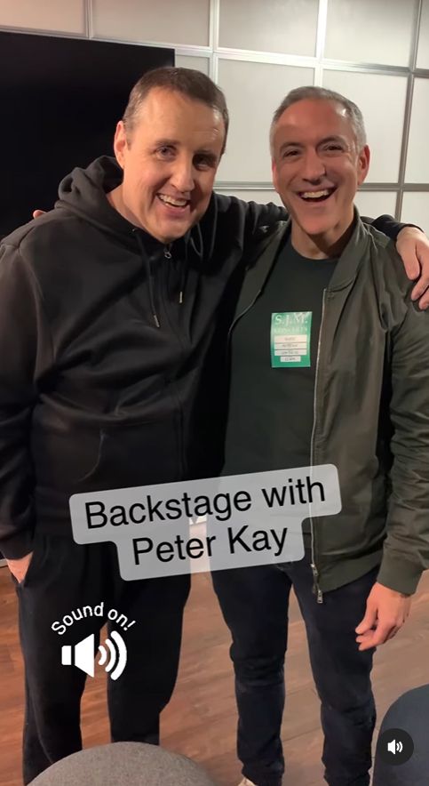 Peter Kay standing with Bryan Edery