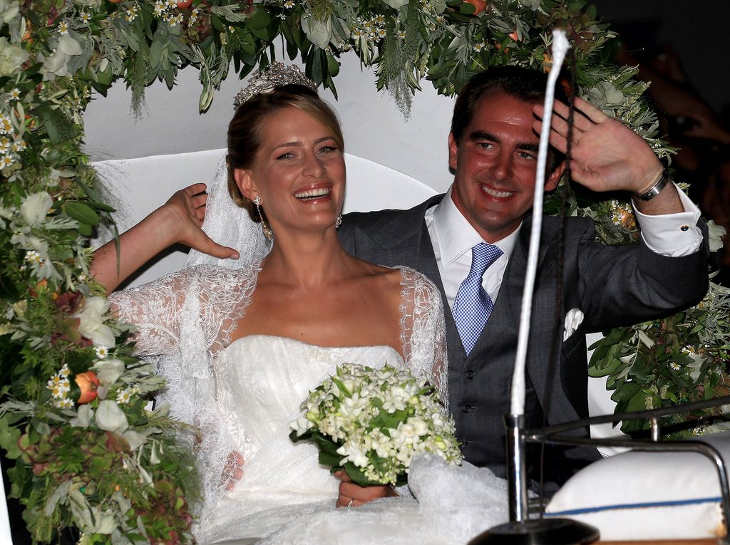 Princess Nikolaos of Greece and Princess Tatiana leave in a horse drawn carriage after getting married at the Cathedral of Ayios Nikolaos (St. Nicholas) on August 25, 2010