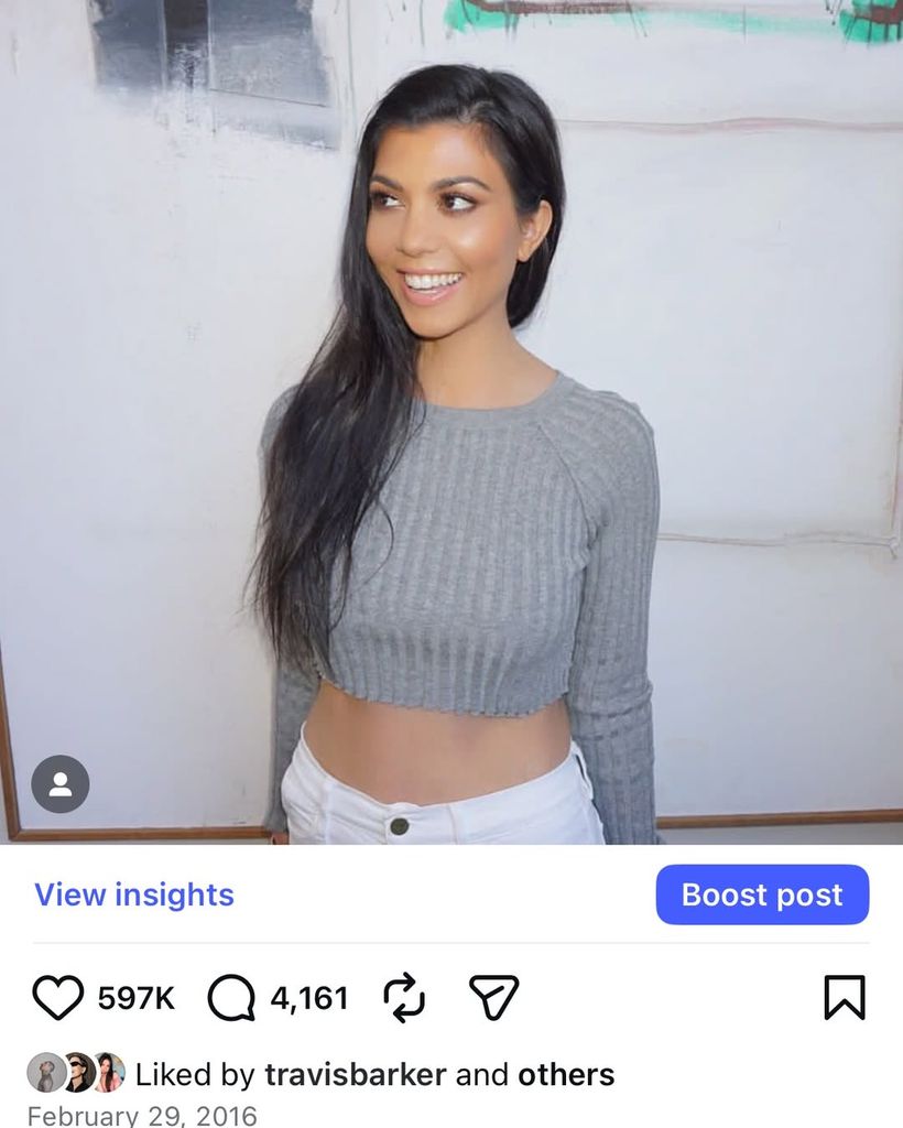 Kourtney Kardashian posing in a picture that was liked by now husband travis barker back in 2016 