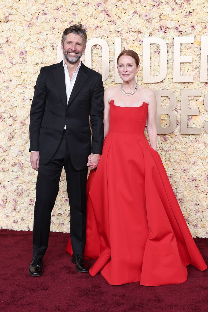 Bart Freundlich and Julianne Moore at the 81st Golden Globe Awards held at the Beverly Hilton Hotel on January 7, 2024 in Beverly Hills, California. (Photo by John Salangsang/Golden Globes 2024/Golden Globes 2024 via Getty Images)