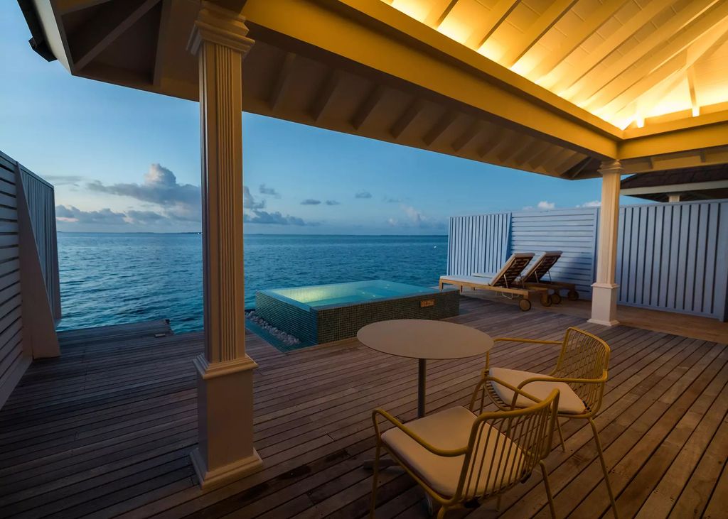 Private decking in overwater room at The Standard, Maldives