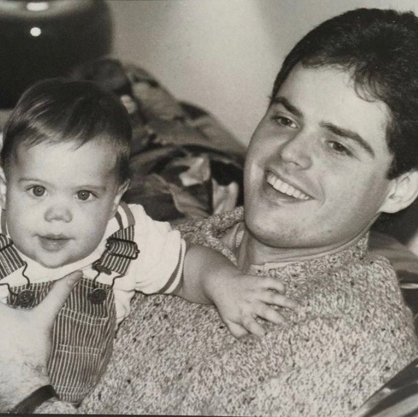 Donny Osmond holding Jeremy Osmond as a baby 