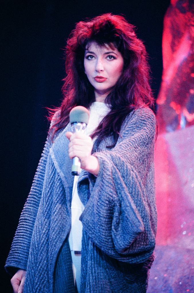 kate bush holding microphone