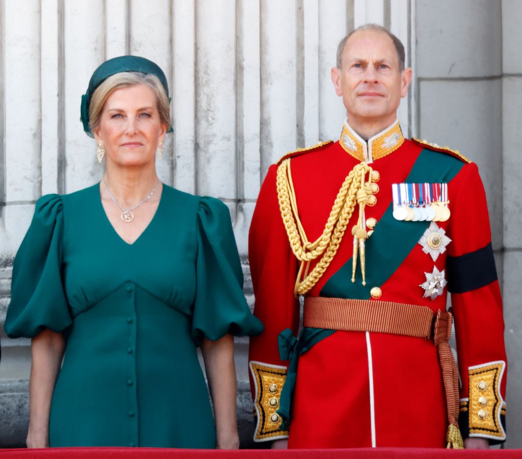 Prince Edward and Sophie standing on palace balcony