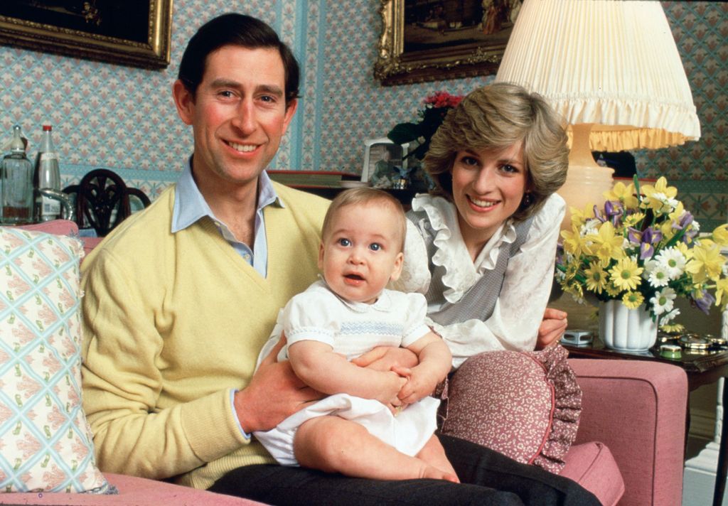 Prince Charles and Diana, Princess of Wales with their baby son, Prince William, at home in Kensington Palace