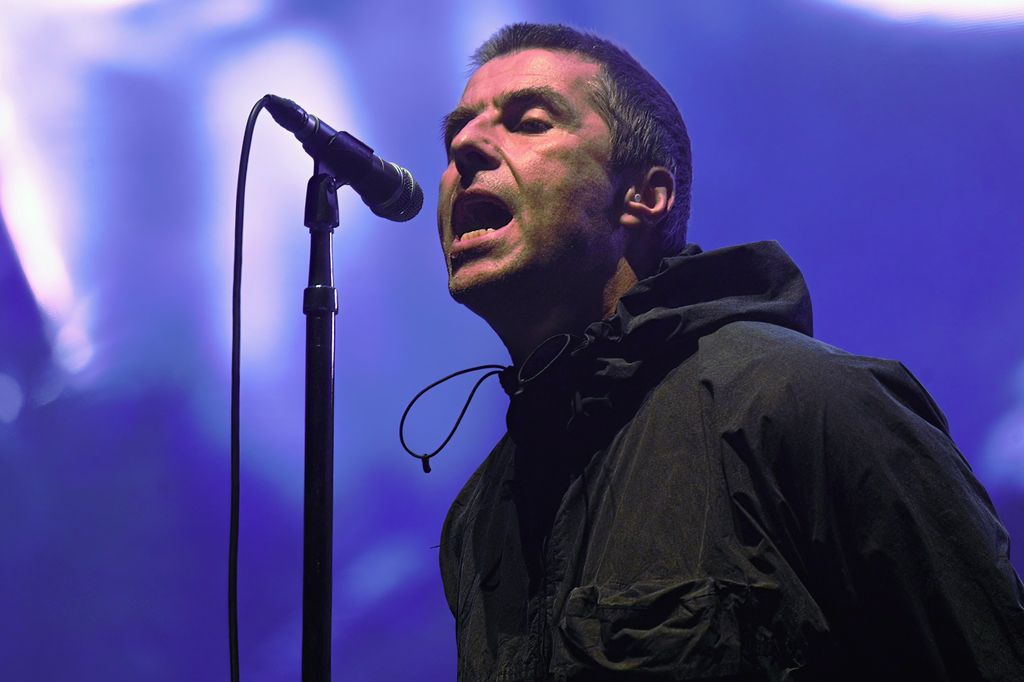 Liam Gallagher performs on stage in 2024