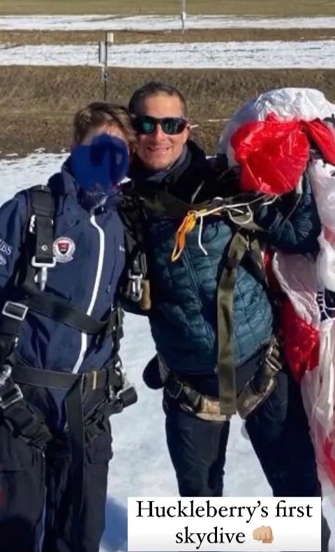 Bear Grylls and Hucklebury following a skydive
